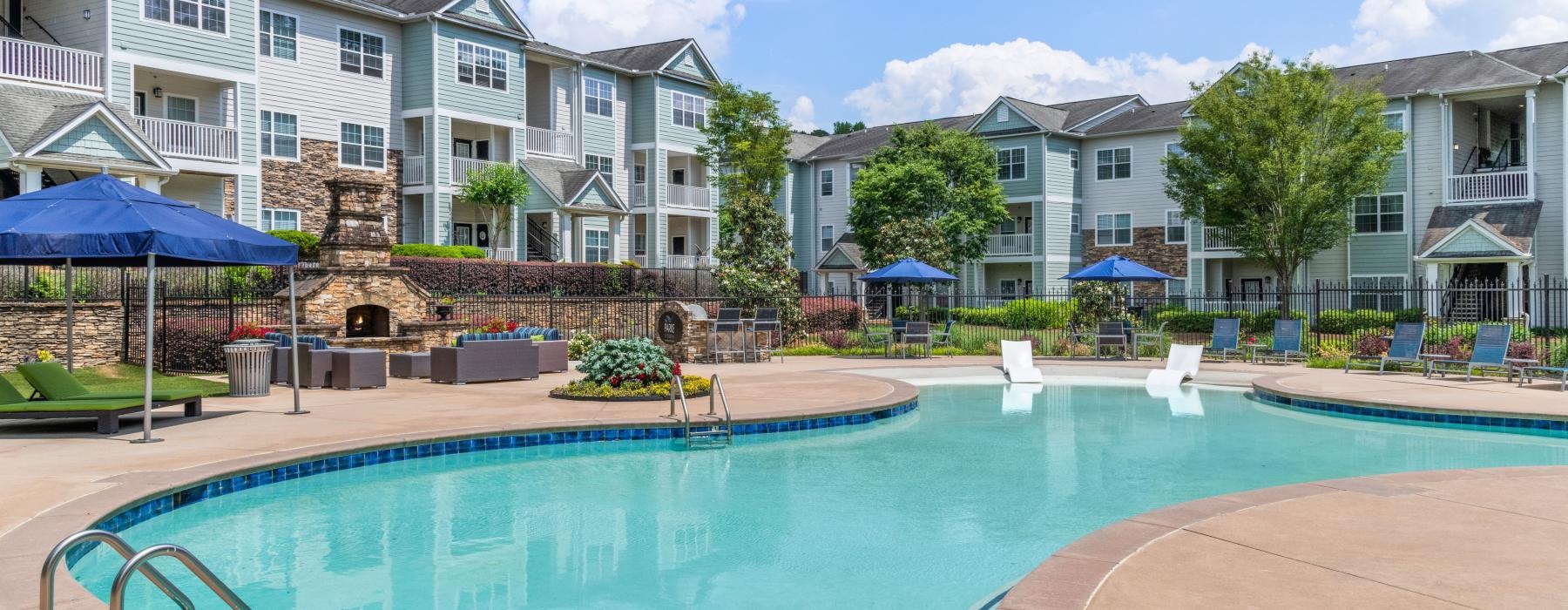 a pool in front of a building